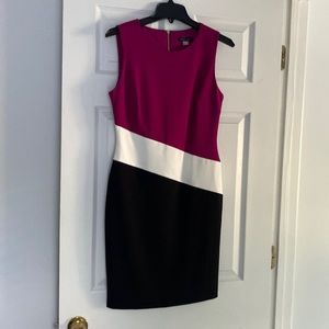 Cute sleeveless dress, never worn, perfect condition.